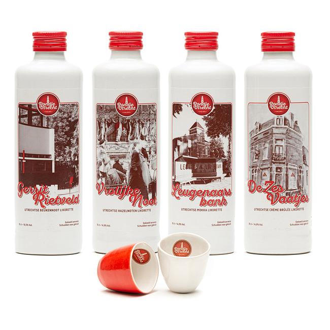 4 Flessen likorette cadeaupakket + 2 keramieken likeur glaasjes